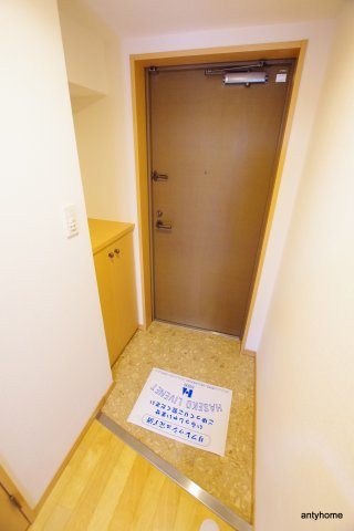 フォレステージュ江坂垂水町　仲介手数料無料の玄関