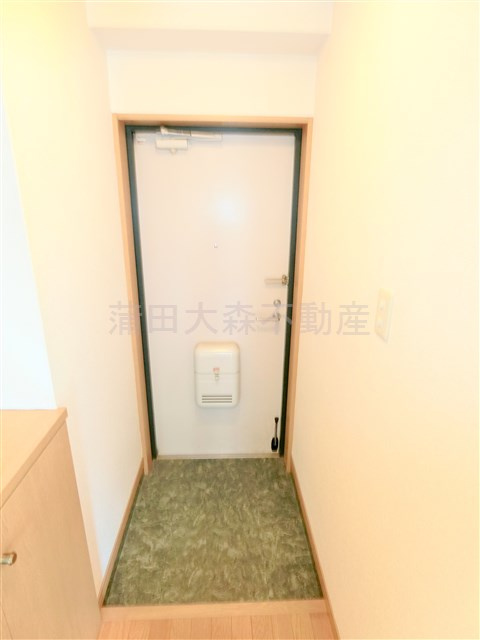 チェアーズ鵜の木の玄関