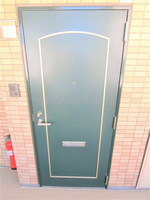 チェアーズ鵜の木の玄関