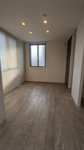 中十条1丁目メゾンの寝室