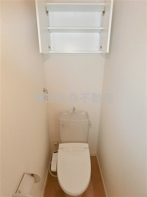 PARK LANE山王（パークレーン山王のトイレ|吊戸棚と温水洗浄便座付きのトイレ