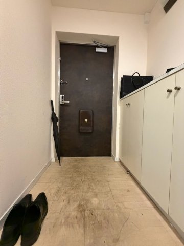 レジデンスＦＦＭ千里丘の玄関