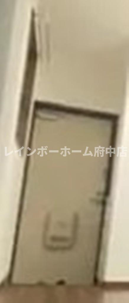 修栄マンションの玄関