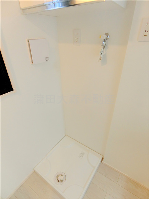 THE ROOM'S ザルームス大森町駅前の設備|上部吊戸棚付！室内洗濯機置き場
