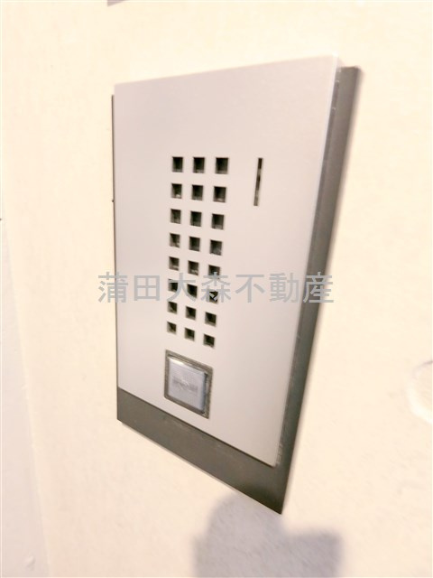 THE ROOM'S ザルームス大森町駅前の玄関