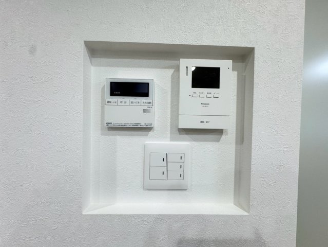 サンライフ霧ケ丘Ⅱー3LDKー【小倉北区　中古マンション】の防犯設備|スイッチ類は一か所にまとめられていて壁がスッキリ見えます♪【小倉北区中古マンション】
