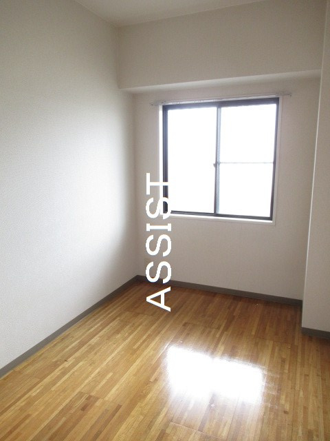 ロイヤルハイツ橋本マンションの洋室