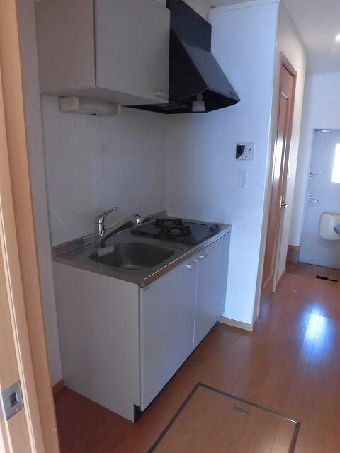 稲城市矢野口のアパートのキッチン