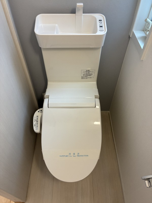 田柄三丁目貸家のトイレ|落ち着いた色調のトイレです