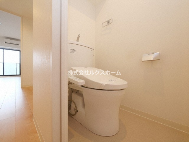 カミオン別院のトイレ|落ち着いた色調のトイレです