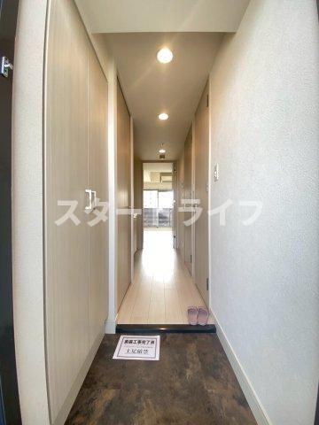 大阪市淀川区木川西２丁目の賃貸マンションの玄関
