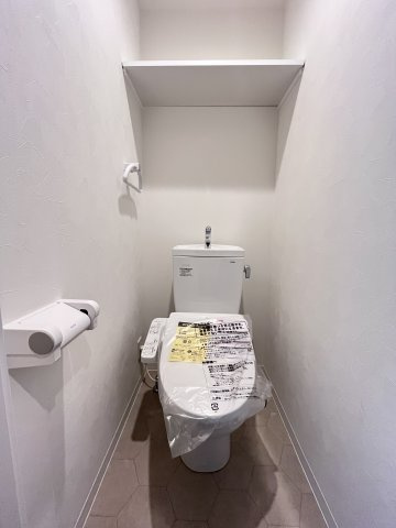 大阪市都島区都島北通１丁目の賃貸マンションのトイレ