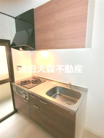 本羽田住宅のキッチン|2口ガスグリル付システムキッチン