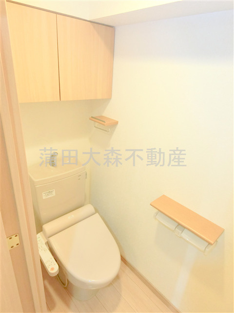 ルーブル下丸子のトイレ|吊り戸棚と温水洗浄便座付きNおトイレ
