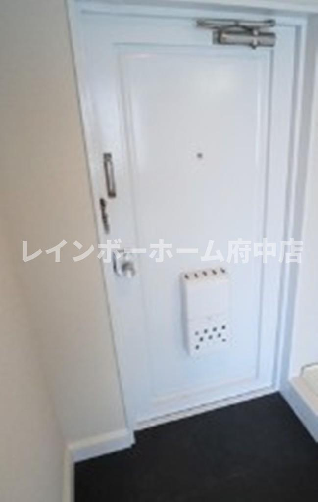 ホームズ稲田堤の玄関
