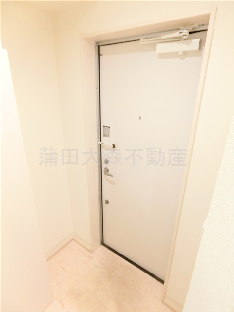 ウェルスクエア蒲田EASTの玄関