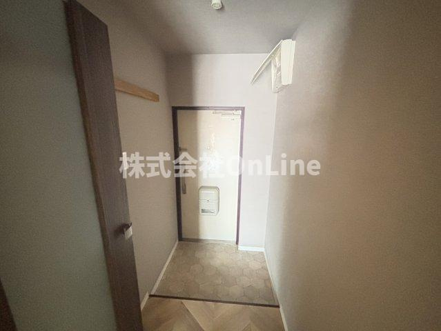 大阪市平野区加美正覚寺３丁目の賃貸マンションの玄関