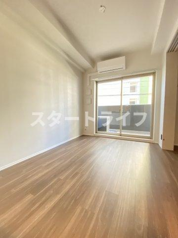 大阪市淀川区西中島７丁目の賃貸マンションの居間・リビング