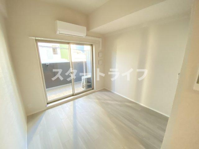 大阪市淀川区西中島７丁目の賃貸マンションの居間・リビング