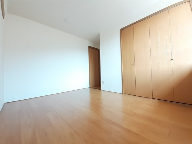 エクセラン春日の洋室