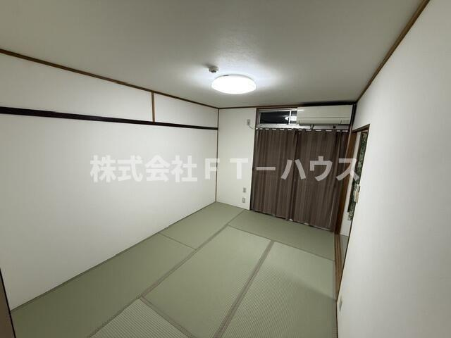 Ｋａｇｕｙａ海神６丁目２０２号室の寝室