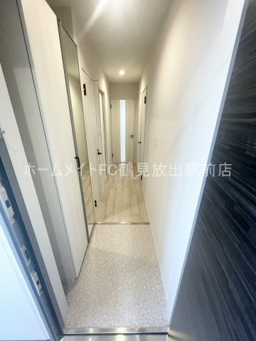 大阪市鶴見区放出東３丁目の賃貸マンションの玄関
