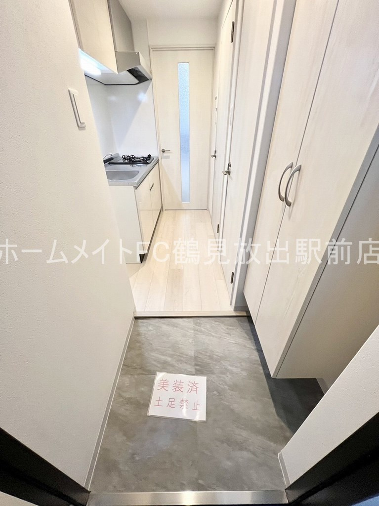 大阪市鶴見区緑１丁目の賃貸マンションの玄関