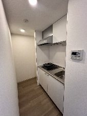 プライムアーク戸越銀座 のキッチン|落ち着いた色調の寝室です