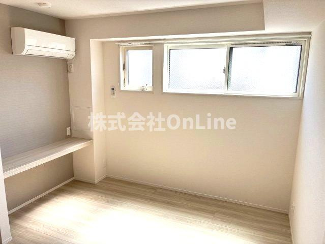 八尾市南植松町４丁目のアパートの寝室