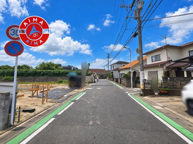 福岡市南区曰佐3丁目第3-2棟（1号棟）の外観|前面道路含む現地の写真です。