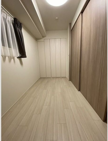 オープンレジデンシア久屋大通 THE COURTの寝室
