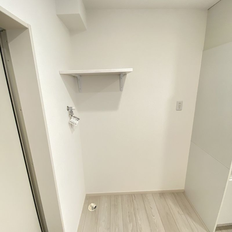 MELDIA竹ノ塚Ⅲの玄関