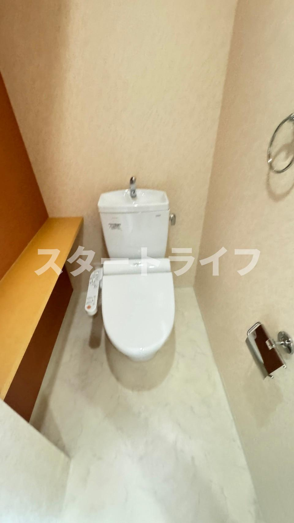 大阪市東淀川区西淡路１丁目の賃貸マンションのトイレ
