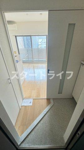 大阪市東淀川区西淡路１丁目の賃貸マンションの玄関