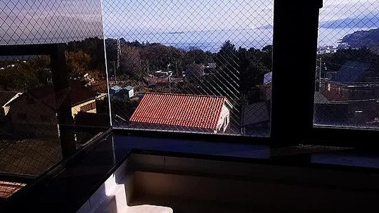 朝日フレール湯河原白沼田の浴室|温泉に浸かりながら窓の外には海を望む贅沢。