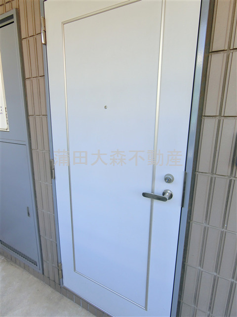 エクセレンスコート橘の玄関