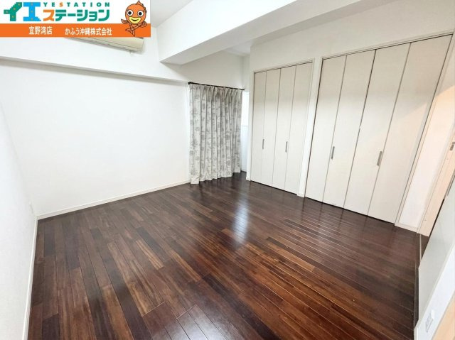ミルコマンション宜野湾大山ビューの洋室|※画像はAI処理により家具を消去しています。