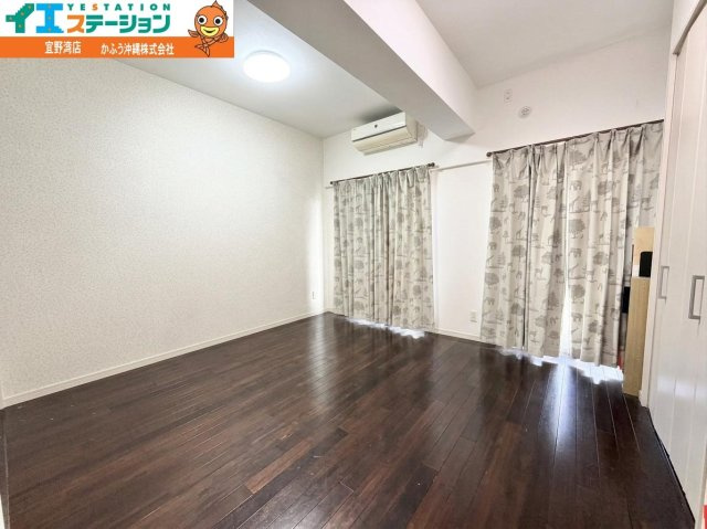 ミルコマンション宜野湾大山ビューの洋室|※画像はAI処理により家具を消去しています。