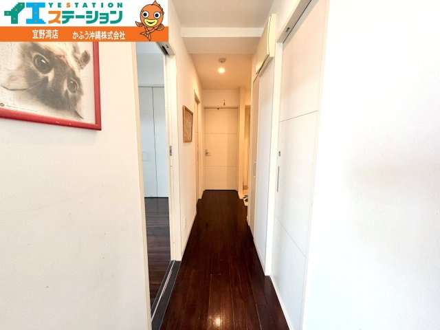 ミルコマンション宜野湾大山ビューの玄関|※画像はAI処理により家具を消去しています。