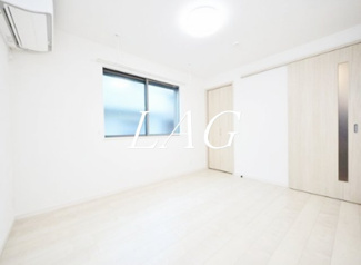 【居間・リビング】 | メゾン三田綱町 | 洋室のお部屋です。