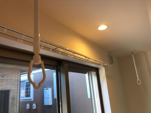 室内物干し竿掛