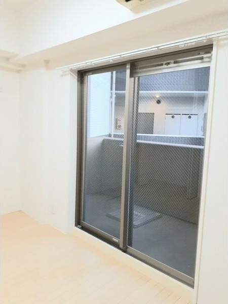 プレサンス名古屋STATIONビジュの洋室