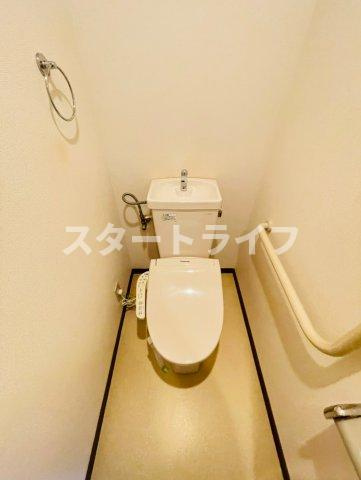 大阪市淀川区東三国５丁目の賃貸マンションのトイレ