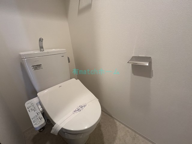 グランカーサ高井田のトイレ|同マンション反転間取り