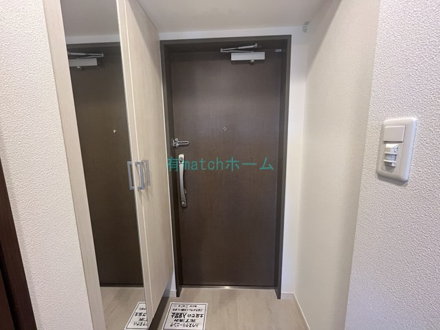 グランカーサ高井田の玄関