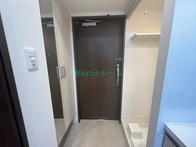 グランカーサ高井田の玄関