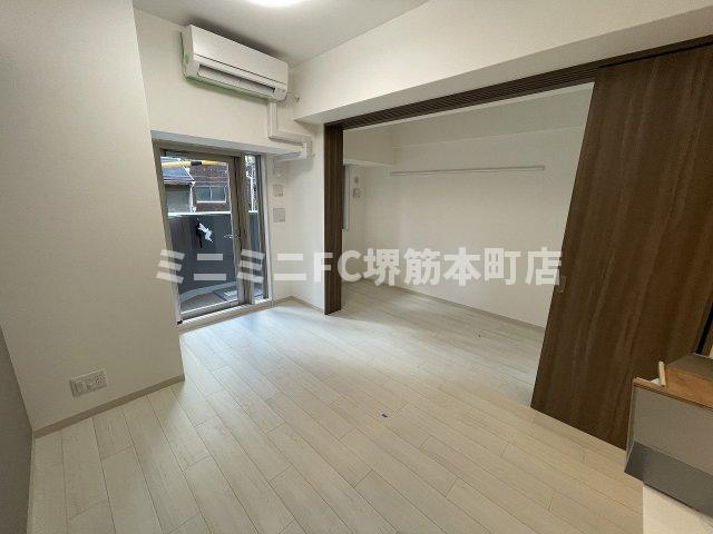 エステムコート堺筋本町の洋室