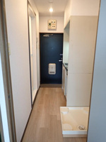 洋室側からのキッチン写真