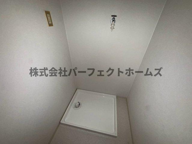 メナール香里園の設備|洗濯機置場です
