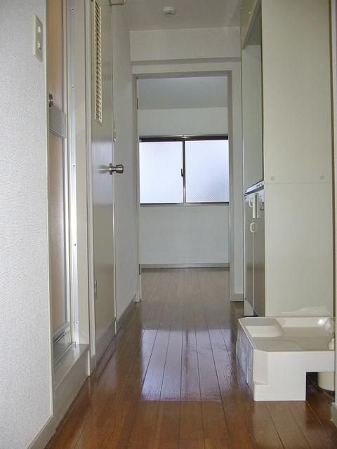 川崎市多摩区宿河原２丁目の賃貸マンションの玄関